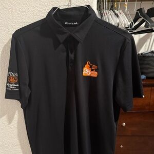 Travis Mathew Black Polo with Orange Accents